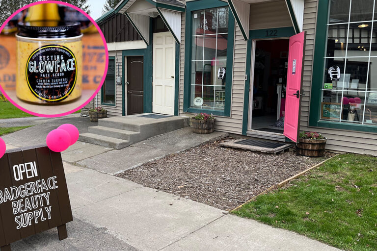 storefront with vibrant pink door and an open sign on the sidewalk with pink balloons, Inset picture shows facial scrub jar